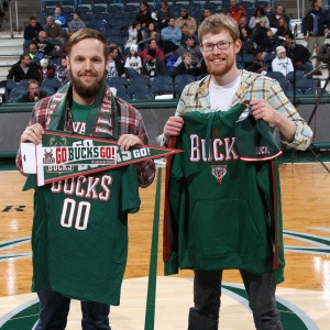 The first #GoBucksGo winner Brandon (right) poses with his new gear with his friend Andrew.